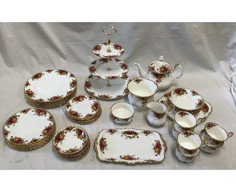 A Royal Albert Old Country Roses Tea and Dinner service set to include a teapot 20cms h, cake stand, flower pot, 6 x tea cups