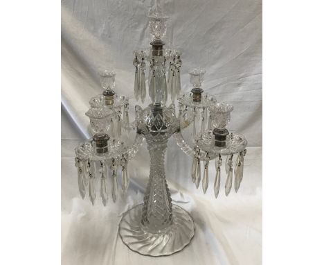 A large glass five branch candelabra, 59cm h x 47cm w, base width 22cm.Condition ReportOne branch broken with glued repair. O