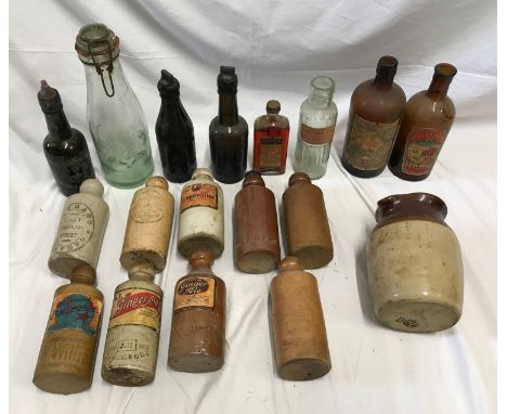 A collection of beer bottles, Newcastle and Sunderland, Poison, Cod Liver Oil, Witch Hazel and Sportsman Scotch Whisky togeth