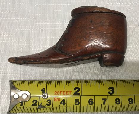 A Victorian treen snuff box in a shape of a shoe. Approx. 9cms l x 5cms h.Condition ReportMinor scuff at toe tip and some sma