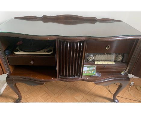 A PYE Series Double 2 record player and radiogram in a cabinet. 110cms w x 7.5cmsh x 42cms d.Condition ReportNot tested.