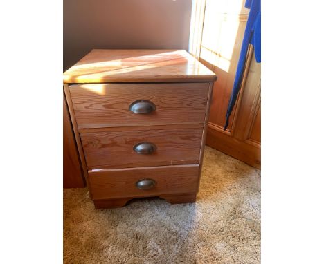 A pine 3 height chest of drawers. Brass handles on bracket feet. 61 d x 57 w x 68cms h.Condition ReportSlight woodworm to top