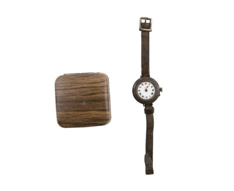 A LAST GIFT FROM JOHN MacBRIDEA gentleman’s wrist watch, early 20th century, with leather strap,  metal case and  enamelled d