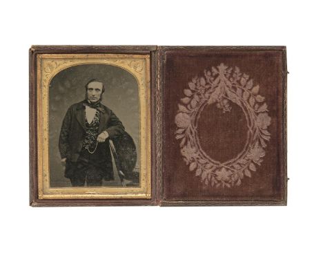 TWO EARLY IRISH DAGUERREOTYPESA single portrait of a gentleman standing, and a family group seated