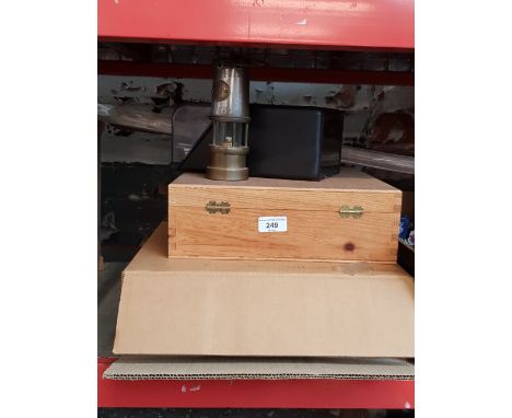 A collection of items to include a small miners lamp, 2 wine wooden boxes, 2 leather filofaxes etc.