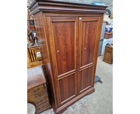 A Willis & Gambier 'Antoinette' double wardrobe. Dimensions- height 197cm, width 117cm and depth 66cm.The interior is fitted 