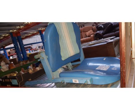 An original seat from Maine Road, Manchester City stadium, together with a 1960s scarf.