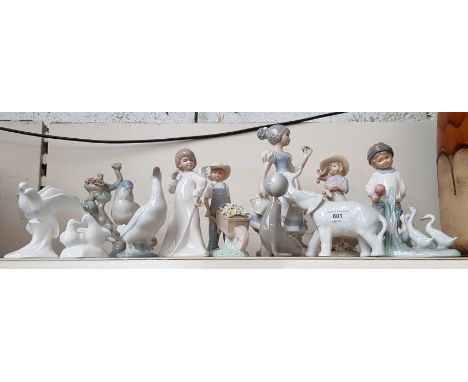 12 figures including examples by Royal Doulton, Nao, Leonardo etc.