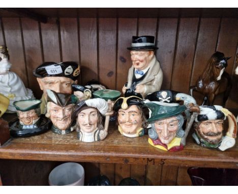 Royal Doulton jugs - large Winston Churchill toby jug (D6171), large character jug Monty D6202, 8 small character jugs and 2 