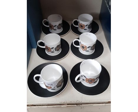 A set of six Susie Cooper cups and saucers. 