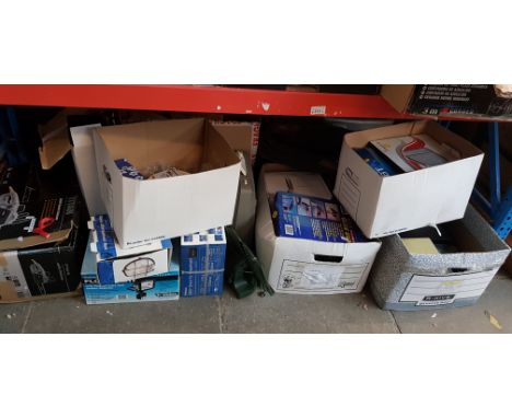 10 boxes of assorted items including electric chain saw, flood lights, portable typewriter, car care kit, box of pottery, CDs