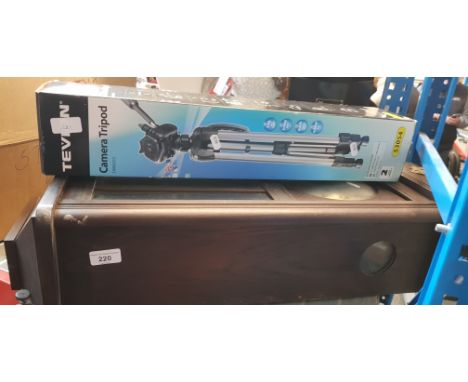 A boxed Tevion camera tripod and a vintage wall clock 