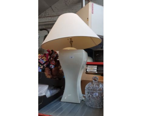 A large ceramic floor standing lamp together with a large urn/floor standing vase 