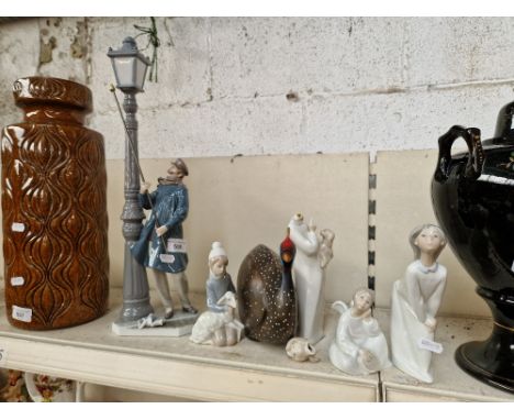 Lladro figure of a lamp lighter, small Lladro figure of a girl and other figures