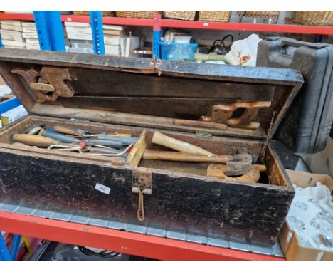 Two wooden tool chests containing shipwright's tools, together with a jigsaw.