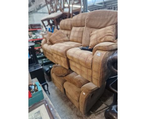 A Parker Knoll three seater electric recliner sofa and matching electric recliner two seater sofa. 