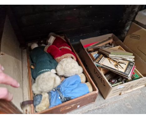 A box of leather working tools and books etc