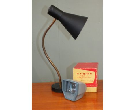 A vintage flexible black metal desk lamp and an Argus slide viewer in original box. This item is sold as a Collectors item on