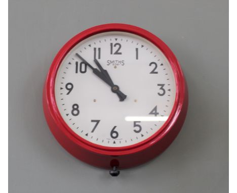 A vintage red Smiths eight day wall clock
