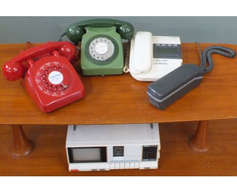 A red telephone, a green telephone, a portable miniature TV/cassette player and other vintage telephones.  This item is sold 