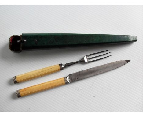 A 19th century fork and knife with ivory handles, steel blades in a shagreen travel case, 23.5 cm 