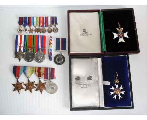 A group of eight WWII and later medals awarded to Commander J. C. EDMONDS to include: The Most Distinguished Order of St. Mic