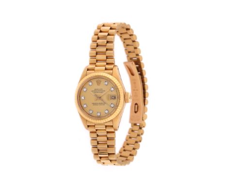 Rolex Datejust, wristwatch, gold, women, reference 6917, manual winding movement. Dial with date register at the 3 o'clock, i