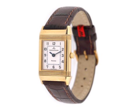 Jaeger-LeCoultre Reverso wristwatch, gold, women, reference 260.1.86, manual winding movement. Silver dial and Arabic numeral