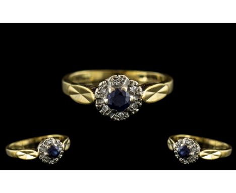 18ct Gold - Attractive and Petite Sapphire and Diamond Set Cluster Ring. Full Hallmark for 18ct. Shank / Setting Excellent Co