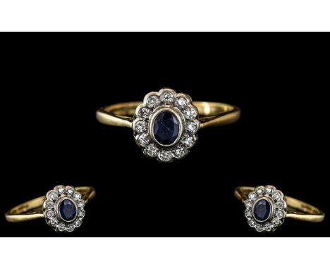 18ct Gold - Ladies Attractive Diamond and Sapphire Set Dress Ring - Flower head Design. The Central Blue Sapphire Surrounded 