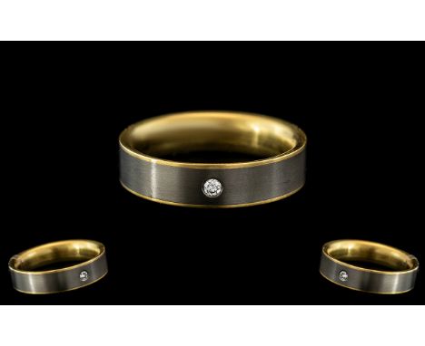 Titanium &amp; Yellow Metal Wedding Band by Feniom, inverted D Section.  Outer edge set with a diamond weighing approx. 0.04 