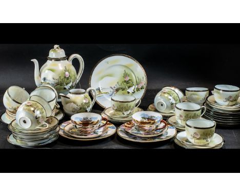 Quantity of Oriental Porcelain, comprising a large teapot, nine teacups, 12 saucers, 12 side plates, two large sandwich/cake 