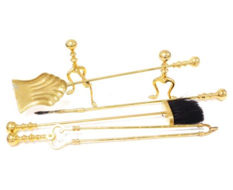 A set of Victorian brass fire irons, comprising a poker, shovel, sugar tongs, and brush, together with a pair of andirons. 