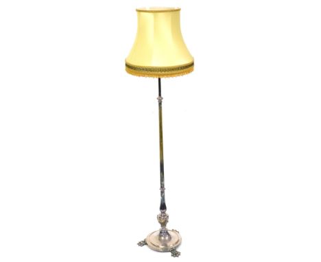 A Victorian silver plated gasolier standard lamp, converted to electricity, in the Adam style, raised on a circular base, on 