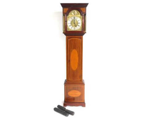An Edwardian mahogany and satinwood longcase clock, the brass break arch dial with foliate and cherubs' head spandrels, silve