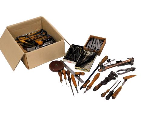 Assorted vintage woodworking tools, including bevelers, awls, files, wrench, chisels, rulers, blades, drill bits, saw blades,