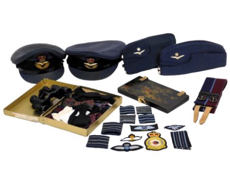 Two RAF Officers peaked caps, a pair of side caps, rank slides and badges, tie press, binoculars and assorted Ordnance Survey