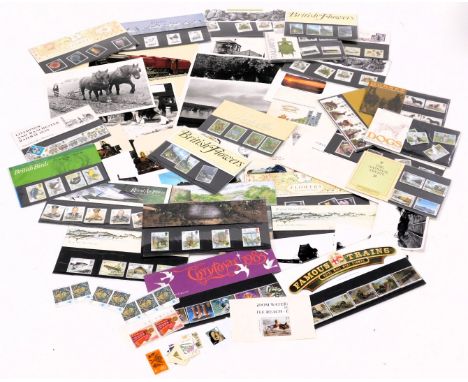 Philately. Postage stamps, mint commemorative sets, including The National Trust, British Flowers, Famous Trains, and The Lin