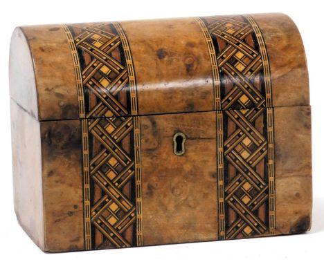 A Victorian walnut and inlaid tea caddy, of domed casket form, the lid opening to reveal a vacant interior, 18cm wide.   On i