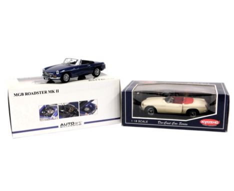 A Kyosho diecast model of an MGB Mk I, scale 1:18, together with an AUTOart Millenium MGB Roadster Mk II, scale 1:18, both bo