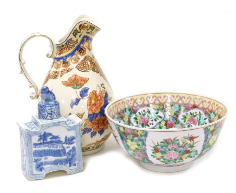 A 20thC Chinese famille rose porcelain goldfish bowl, decorated with flowers, 31cm wide, a Panda pottery wash jug, decorated 