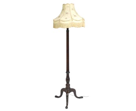 A Victorian mahogany torchere stand, converted to a standard lamp, with a fluted, reeded and foliate carved turned column, ra