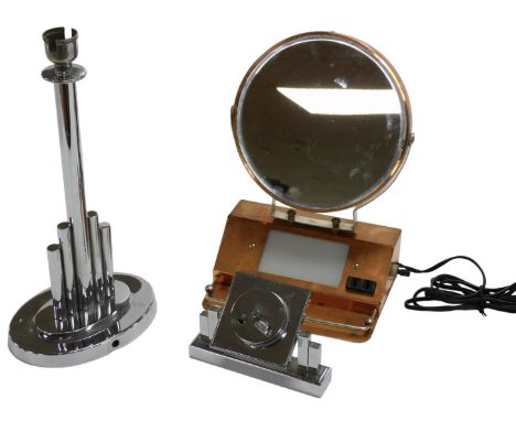 An Art Deco chrome table lamp, 31cm high, together with an Asprey chrome cased clock, with eight day movement, and a copper c