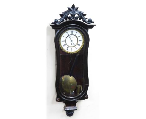 A late 19thC German rosewood key-hole cased wall clock, by Keller Rudolph, circular floral embossed dial with enamel chapter 