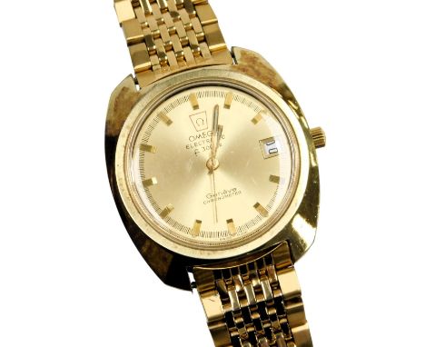 An Omega electronic F300HS gold plated chronometer wristwatch, circular champagne dial with centre seconds, and date aperture