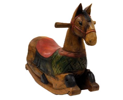 A painted wooden rocking horse, 68cm wide,