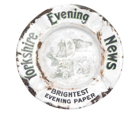 An early 20thC enamel advertising ashtray, for The Yorkshire Evening News, Brightest Evening Paper, 13.5cm wide.