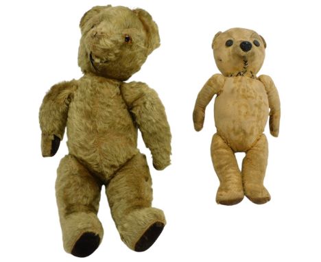 A vintage teddy bear, with black button eyes, 33cm high, and a further teddy bear, straw filled, 38cm high. (2) 