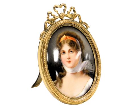 A late 19thC porcelain portrait miniature, signed Schunzel, head and shoulders portrait of Queen Louise of Prussia, in a bras