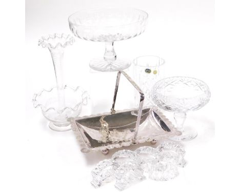 A group of Victorian and later cut glass, including a single stem epergne, six cut glass napkin rings, and a pedestal sweat m